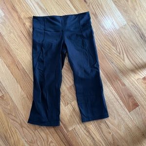 Lululemon women’s size 8 black crop leggings workout split calf lulu